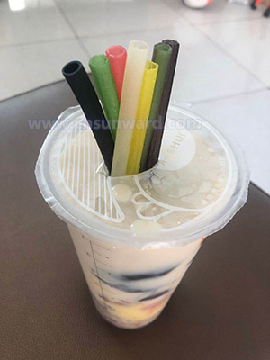 tasty milk tea and edible drinking straw